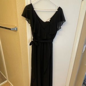 Worn once, beautiful flowy black dress.  Very flattering and comfortable.